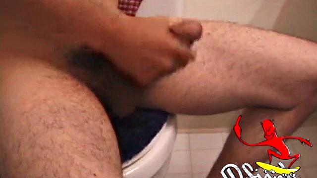 Marcus makes a manly impression as he slips away to the bathroom with his laptop to catch a little private time. He gets really into the porn he's watching and strips off his red boxers.