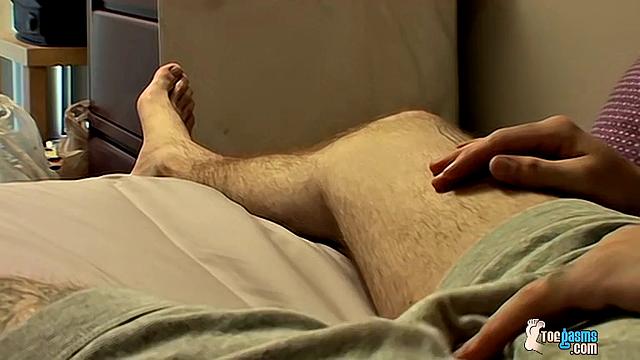 Evan Heinze Enjoys Sock-On-Cock Fun