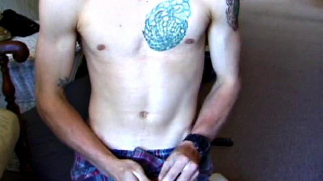 While on a break from doing yard work, Shane strips naked and starts getting stiff. He works the remote, and his cock, until finally pumping a messy cum load onto a towel.