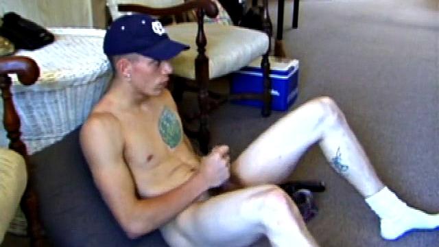 While on a break from doing yard work, Shane strips naked and starts getting stiff. He works the remote, and his cock, until finally pumping a messy cum load onto a towel.