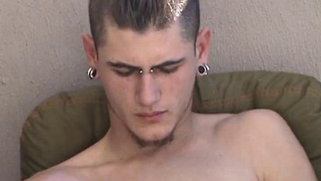 Pony rubs his pierced cock in the afternoon sun. He stands up and asks if we would like to see his dick. Of course! What follows is a jerk off session with a happy ending.