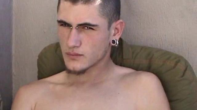 Pony rubs his pierced cock in the afternoon sun. He stands up and asks if we would like to see his dick. Of course! What follows is a jerk off session with a happy ending.