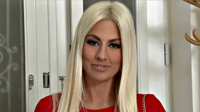 Flexi Bunny with bald pussy pierced in sexy lingerie gives a seductive one-on-one handjob in the bedroom