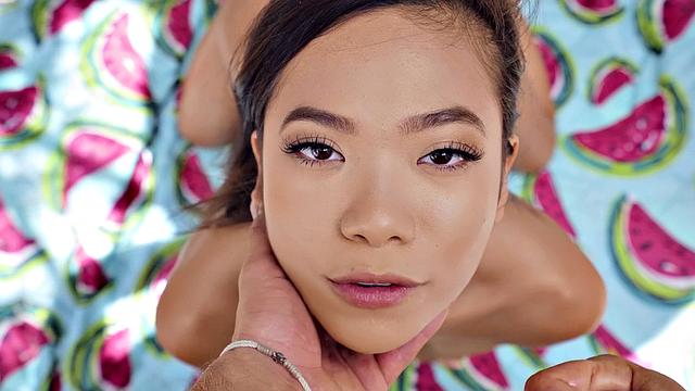 Kinky tattooed brunette gets wet and wild on the beach with a ball in her mouth and pussy