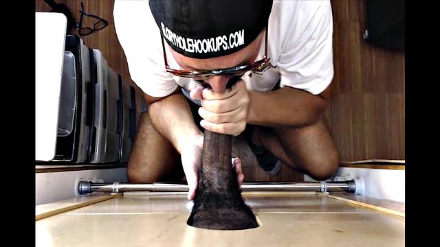 Black Man Receives Gloryhole Blowjob
