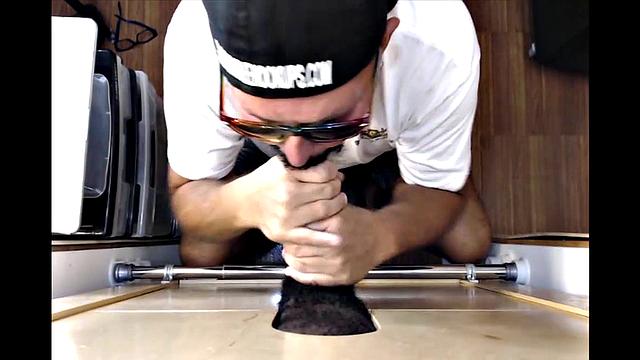 Black Man Receives Gloryhole Blowjob