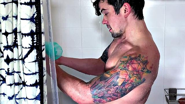 Showering muscled amateur jerks and toys butthole for cum