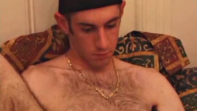 When Tag returns from skateboarding he heads to the bedroom and turns on a video. He begins stripping down and his growing cock flops out. Tag pulls out a couple of sex toys.