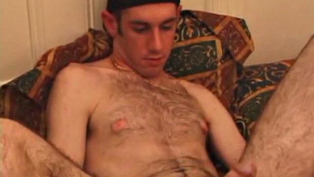 When Tag returns from skateboarding he heads to the bedroom and turns on a video. He begins stripping down and his growing cock flops out. Tag pulls out a couple of sex toys.