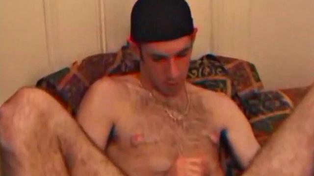 When Tag returns from skateboarding he heads to the bedroom and turns on a video. He begins stripping down and his growing cock flops out. Tag pulls out a couple of sex toys.