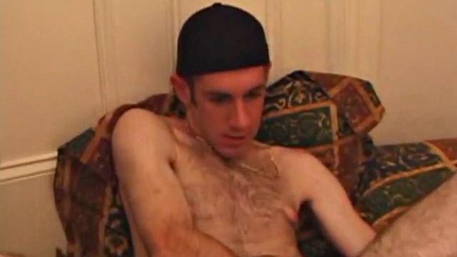 When Tag returns from skateboarding he heads to the bedroom and turns on a video. He begins stripping down and his growing cock flops out. Tag pulls out a couple of sex toys.