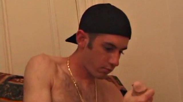 When Tag returns from skateboarding he heads to the bedroom and turns on a video. He begins stripping down and his growing cock flops out. Tag pulls out a couple of sex toys.