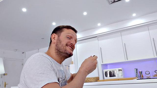 Watch this sexy kitchen cutie get down and dirty with a guy in socks and shorts