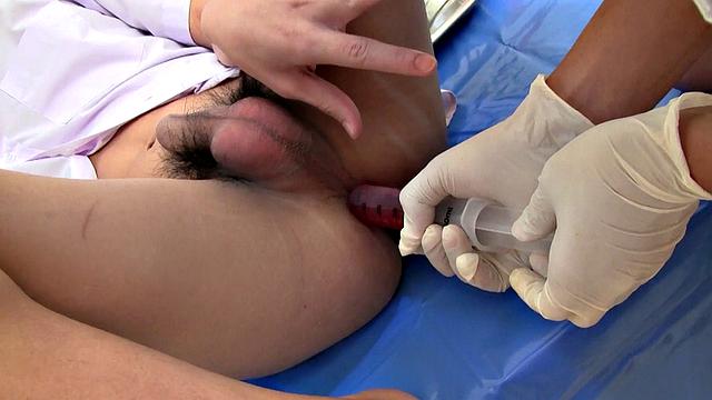 Inked Asian twink sucked off barebacked by doctor