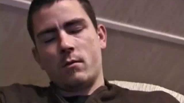 By the time the camera finds him, Dan is already going for his woody. A bit uncomfortable in the chair, he stands up and moves to the staircase, where we can see his hot cock getting harder and harder.