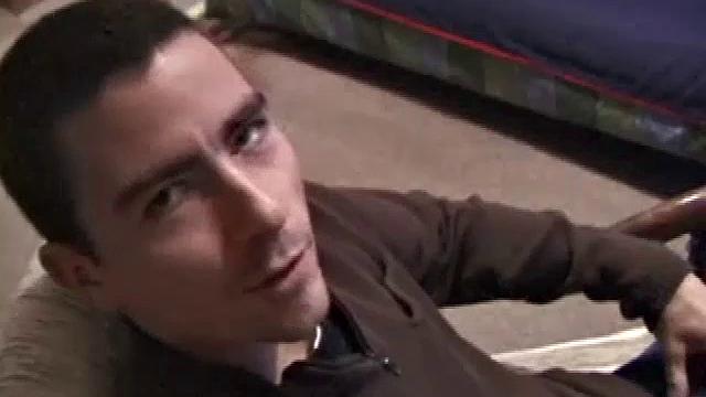 By the time the camera finds him, Dan is already going for his woody. A bit uncomfortable in the chair, he stands up and moves to the staircase, where we can see his hot cock getting harder and harder.