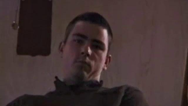 By the time the camera finds him, Dan is already going for his woody. A bit uncomfortable in the chair, he stands up and moves to the staircase, where we can see his hot cock getting harder and harder.