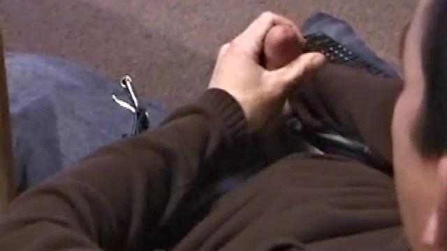 By the time the camera finds him, Dan is already going for his woody. A bit uncomfortable in the chair, he stands up and moves to the staircase, where we can see his hot cock getting harder and harder.