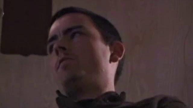 By the time the camera finds him, Dan is already going for his woody. A bit uncomfortable in the chair, he stands up and moves to the staircase, where we can see his hot cock getting harder and harder.