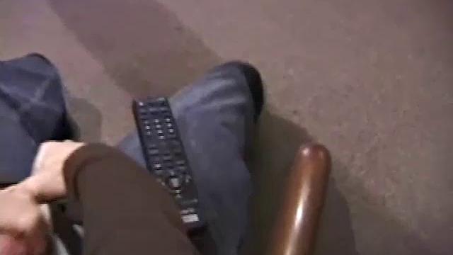 By the time the camera finds him, Dan is already going for his woody. A bit uncomfortable in the chair, he stands up and moves to the staircase, where we can see his hot cock getting harder and harder.