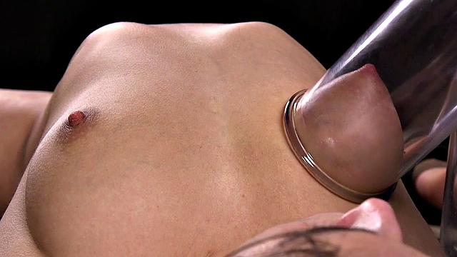 BDSM sub with vacuumed boobs suffers pussy pulling