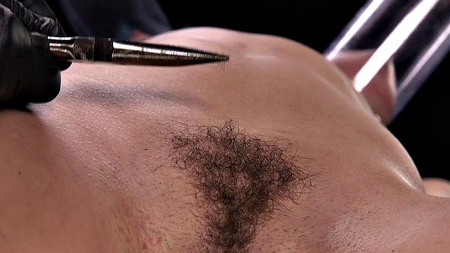 BDSM sub with vacuumed boobs suffers pussy pulling