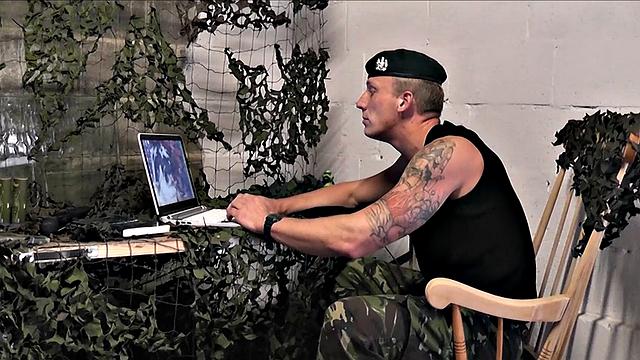 SInked woman takes on a big army cock