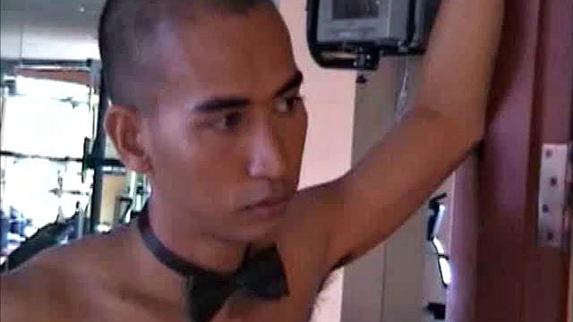 This Asian guy visits a restaurant and the waiter takes his order, fully clothed, but returns wearing an apron. The customer and waiter slip into a more private area to satisfy his hunger.