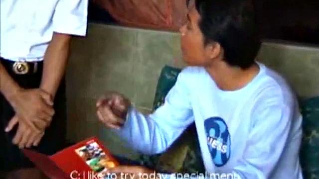 This Asian guy visits a restaurant and the waiter takes his order, fully clothed, but returns wearing an apron. The customer and waiter slip into a more private area to satisfy his hunger.