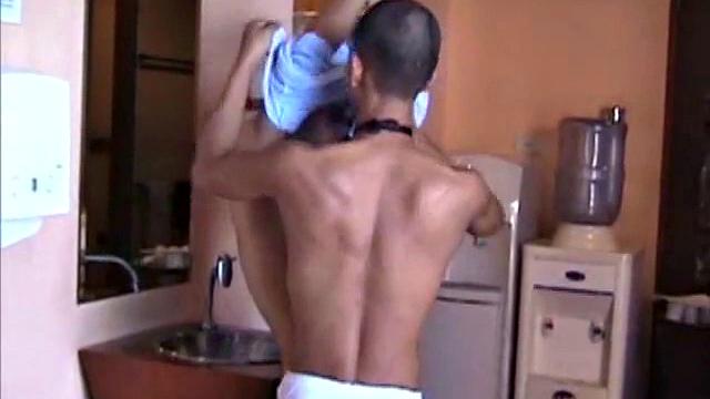 This Asian guy visits a restaurant and the waiter takes his order, fully clothed, but returns wearing an apron. The customer and waiter slip into a more private area to satisfy his hunger.