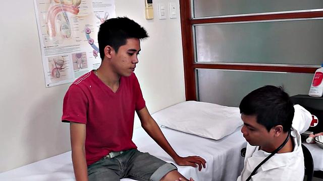 Gay doctor loves fingering twink in meeting room