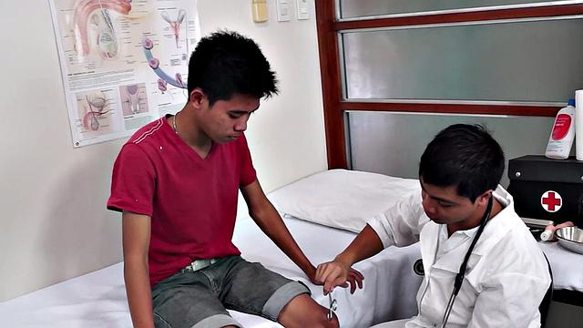 Gay doctor loves fingering twink in meeting room