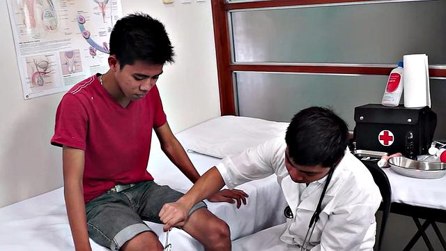 Gay doctor loves fingering twink in meeting room