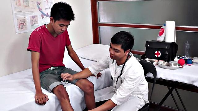 Gay doctor loves fingering twink in meeting room