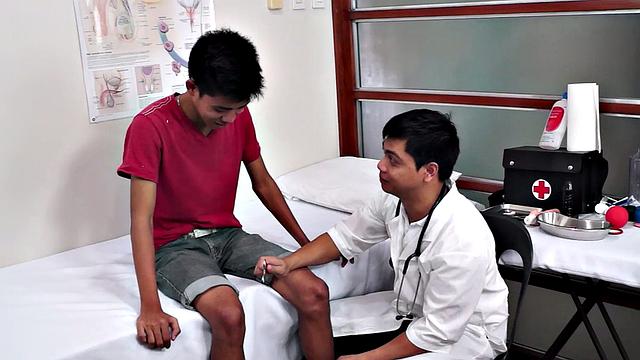 Gay doctor loves fingering twink in meeting room