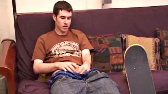 Brian Barrett pulls out his dick and starts stroking. Soon a large anal sex toy approaches from off camera and penetrates Brian's hole. After inserting a second dildo, Brian blows his load.