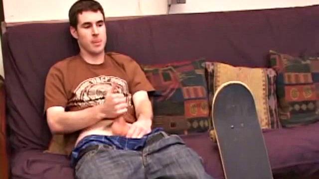 Brian Barrett pulls out his dick and starts stroking. Soon a large anal sex toy approaches from off camera and penetrates Brian's hole. After inserting a second dildo, Brian blows his load.