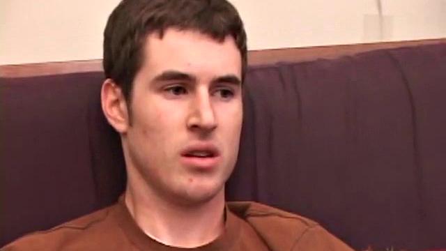 Brian Barrett pulls out his dick and starts stroking. Soon a large anal sex toy approaches from off camera and penetrates Brian's hole. After inserting a second dildo, Brian blows his load.