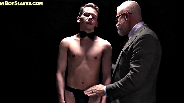 Dominant businessmen fuck twink in front of voyeurs