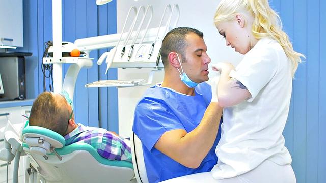 Slutty nurse fucked by lusty doctor in medical room