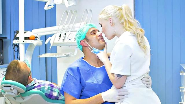 Slutty nurse fucked by lusty doctor in medical room