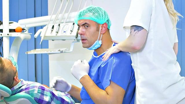 Slutty nurse fucked by lusty doctor in medical room