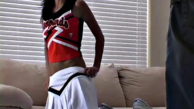 Sexy busty cheerleader Mandy shows off her body
