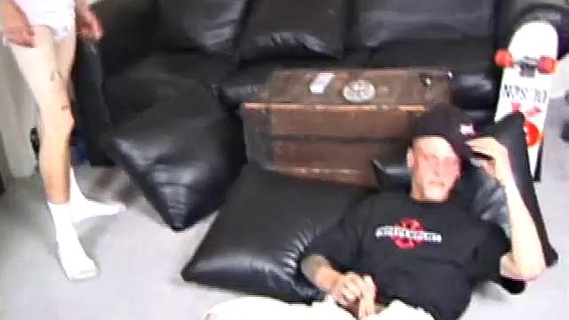These two tough looking skater boys are on the floor, leaned up against some black leather pillows, with their dicks in hand. Seth is tugging away while staring at the girl on a porn they are watching, as she gets impaled by a giant cock.