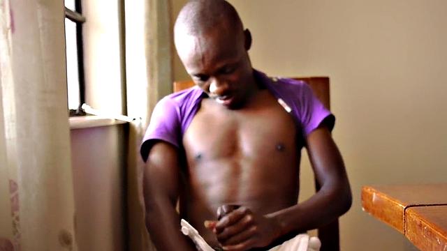 Amateur African twink jerks cock at home in private clip