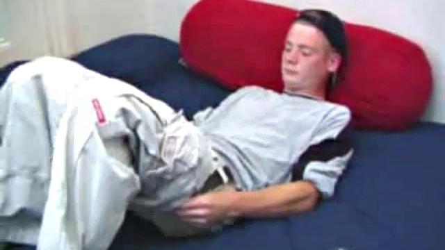 Red pulls down his pants and starts tugging on his cock, while asking if we want to suck on it. He uses a finger to work on his ass, while the other hand strokes his hard meat.