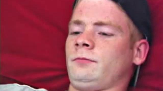 Red pulls down his pants and starts tugging on his cock, while asking if we want to suck on it. He uses a finger to work on his ass, while the other hand strokes his hard meat.