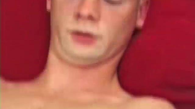 Red pulls down his pants and starts tugging on his cock, while asking if we want to suck on it. He uses a finger to work on his ass, while the other hand strokes his hard meat.