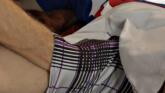 Sitting together on the sofa, young Gerard can't wait to get into mature hairy Andres' pants. While they kiss, the horny boy reaches in and pulls out his daddy's already stiff uncut cock.