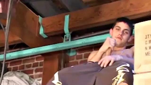 TJ Kummings has parked his naked ass in a garage loft for this solo jack off video. And of ass, he plays with his a lot along the way.